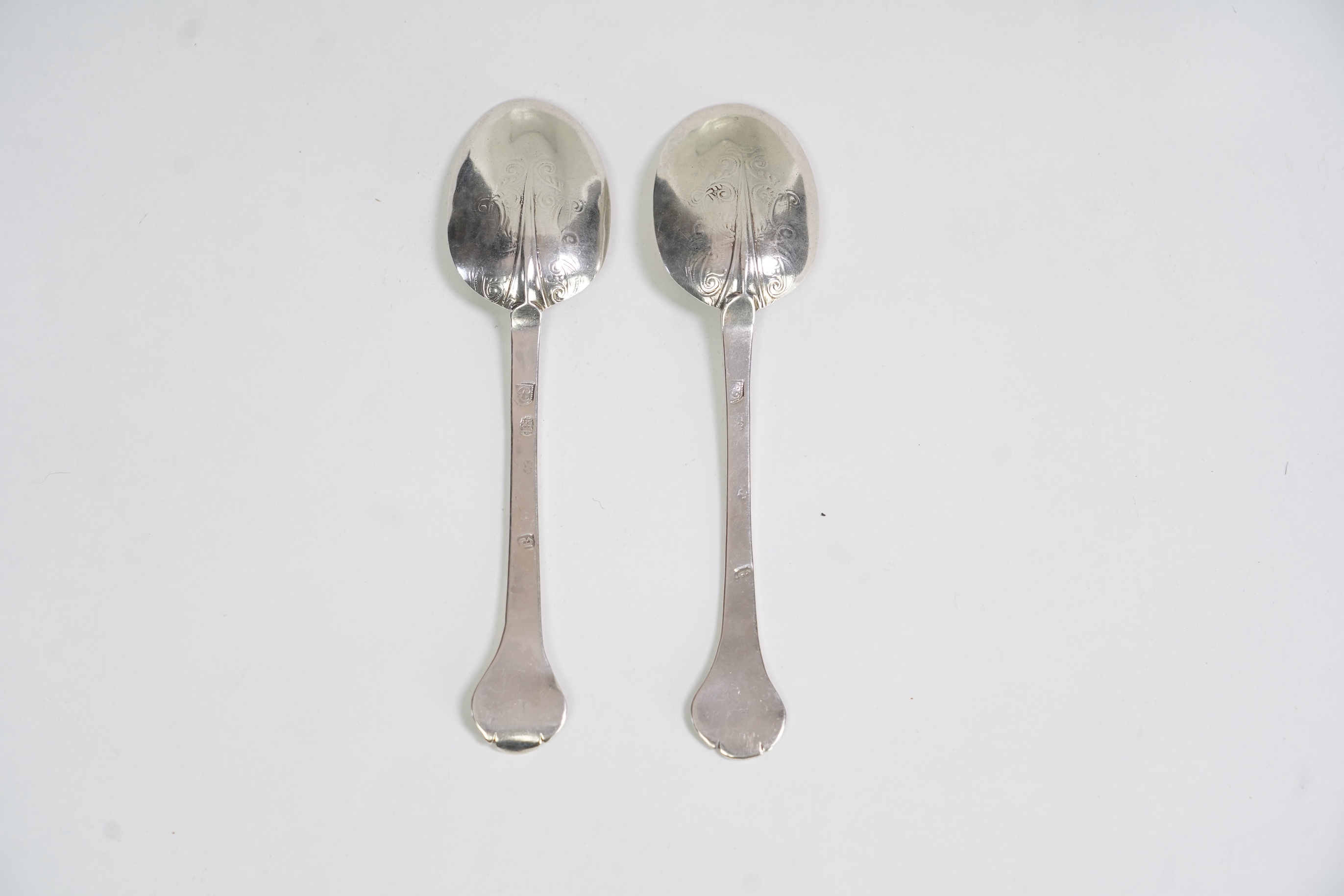 A pair of Charles II silver lace back trefid spoons, maker PL (Jackson's ref. p.137)